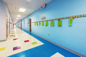 Elementary School Hallway with Blue Walls