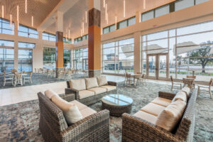 Seating area overlooking veranda of New Bern Riverfront Convention Center in Craven County, NC