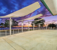 Retracting awnings over veranda at New Bern Riverfront Convention Center in Craven County, NC