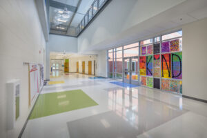 Barton Pond Elementary School Two-Story Lobby with Colorful Floor Tilers