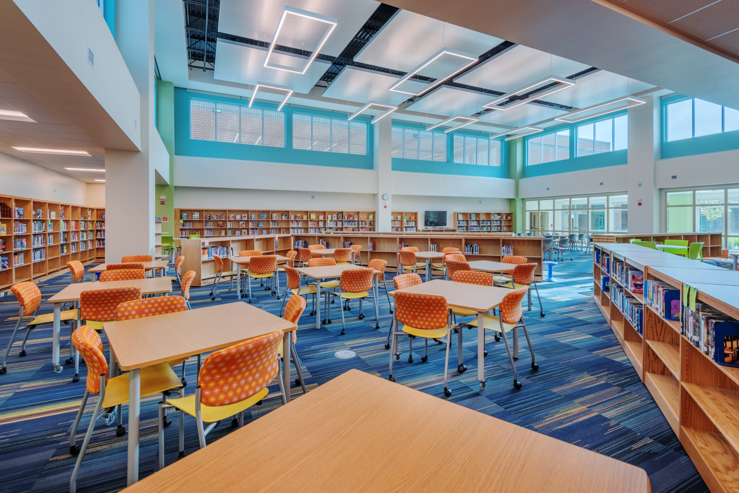 Neuse River Middle School Media Center with Bookshelves, Books, and Tables