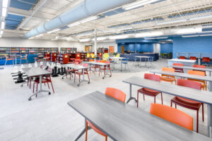 Trask Middle School Media Center with Tables, Chairs, Books, and a Large Chess Set