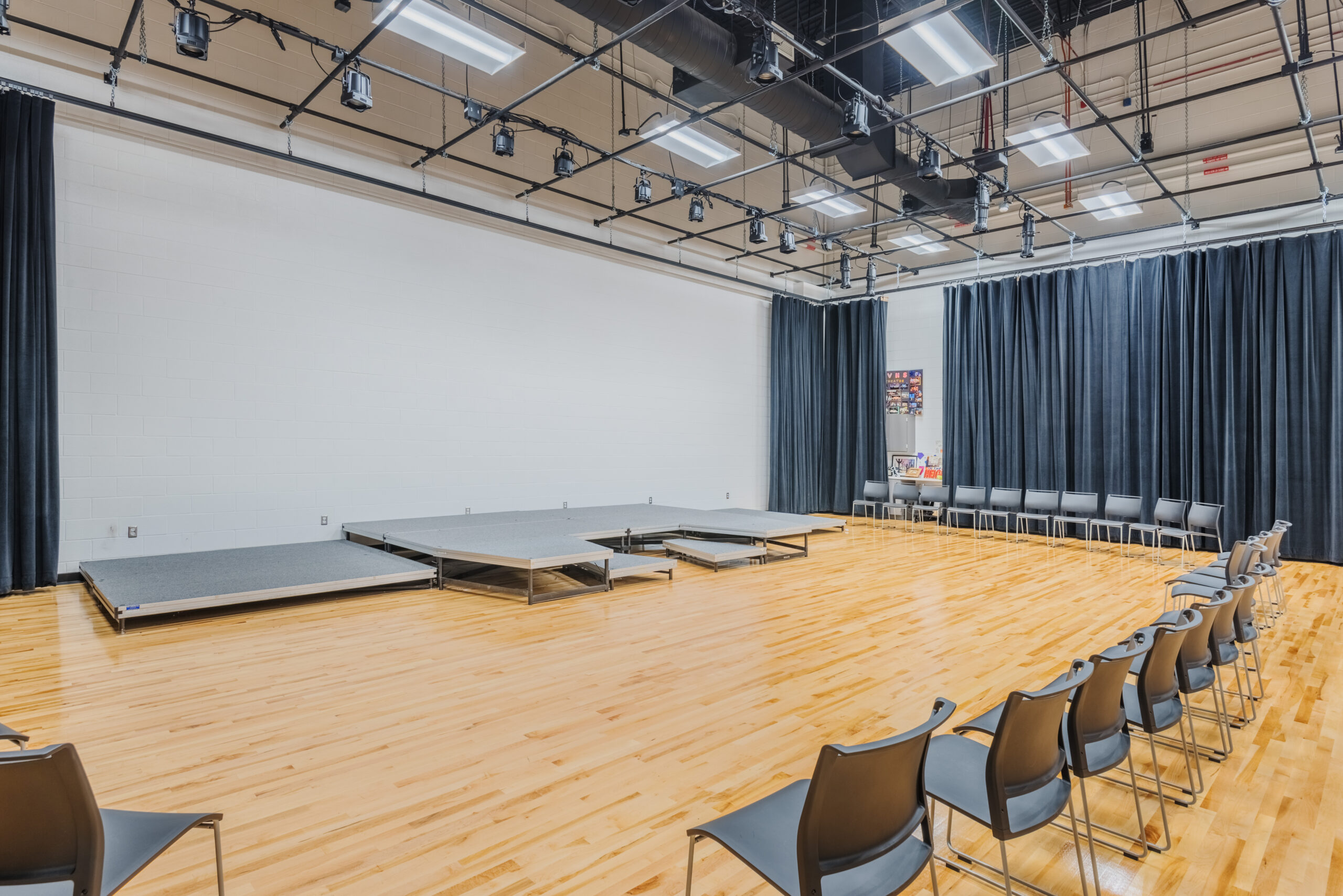 Fuquay-Varina High School Drama Room with a Platform and Overhead Stage Lighting