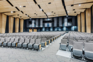 Fuquay-Varina High School Auditorium with Gray Cushion Seats and State-Of-The-Art Acoustical Equipment
