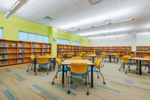 Media Center with Books, Tables, and Chairs