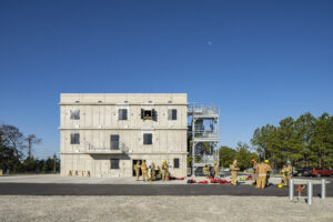 Firefighters Practicing in Concrete Live Burn Building