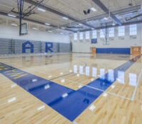 Main Gym Basketball Court with Bleachers